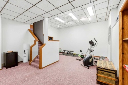 149 Edgehill Drive Nw, Calgary, AB - Indoor Photo Showing Gym Room