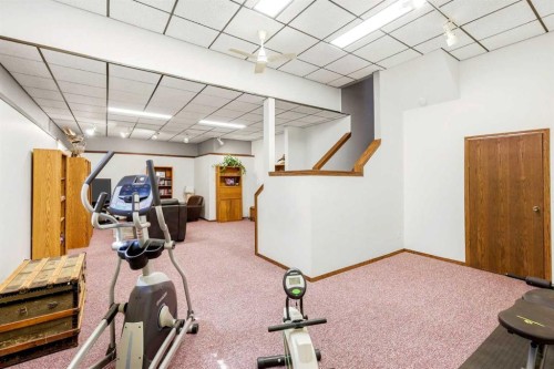 149 Edgehill Drive Nw, Calgary, AB - Indoor Photo Showing Gym Room