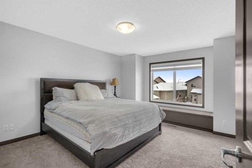 1121 Kingston Crescent Se, Airdrie, AB - Indoor Photo Showing Bedroom