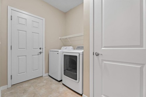 30 Redstone Parade Ne, Calgary, AB - Indoor Photo Showing Laundry Room