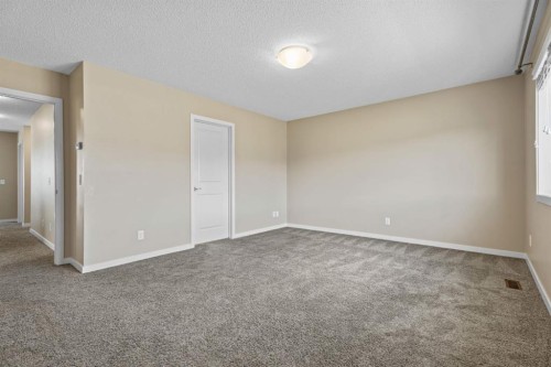 30 Redstone Parade Ne, Calgary, AB - Indoor Photo Showing Other Room