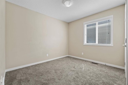 30 Redstone Parade Ne, Calgary, AB - Indoor Photo Showing Other Room