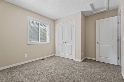 30 Redstone Parade Ne, Calgary, AB - Indoor Photo Showing Other Room