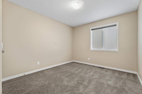 30 Redstone Parade Ne, Calgary, AB - Indoor Photo Showing Other Room