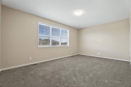 30 Redstone Parade Ne, Calgary, AB - Indoor Photo Showing Other Room