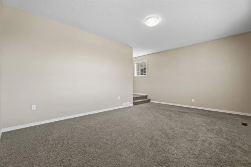 30 Redstone Parade Ne, Calgary, AB - Indoor Photo Showing Other Room