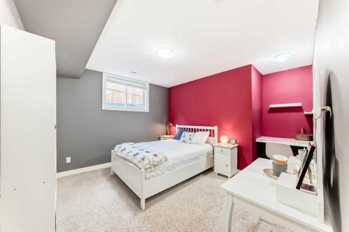 609 Downey Place, Okotoks, AB - Indoor Photo Showing Bedroom