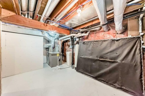 609 Downey Place, Okotoks, AB - Indoor Photo Showing Basement
