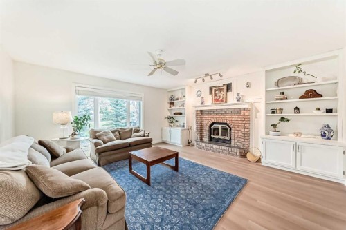 609 Downey Place, Okotoks, AB - Indoor Photo Showing Living Room With Fireplace