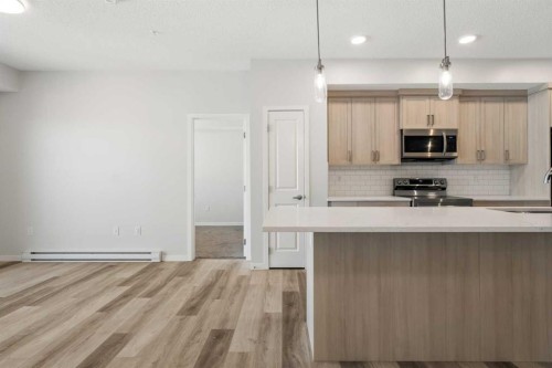 3403-33 Carringham Gate Nw, Calgary, AB - Indoor Photo Showing Kitchen