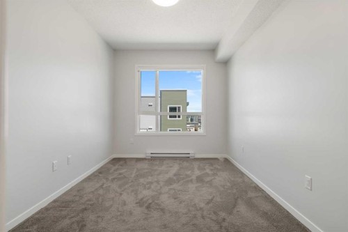 3403-33 Carringham Gate Nw, Calgary, AB - Indoor Photo Showing Other Room
