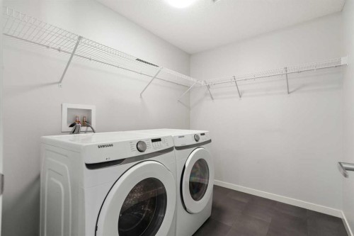 3403-33 Carringham Gate Nw, Calgary, AB - Indoor Photo Showing Laundry Room
