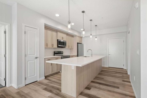 3403-33 Carringham Gate Nw, Calgary, AB - Indoor Photo Showing Kitchen With Upgraded Kitchen