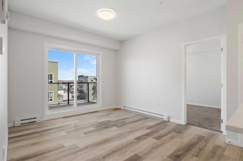 3403-33 Carringham Gate Nw, Calgary, AB - Indoor Photo Showing Other Room