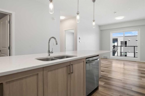 3403-33 Carringham Gate Nw, Calgary, AB - Indoor Photo Showing Kitchen With Double Sink With Upgraded Kitchen