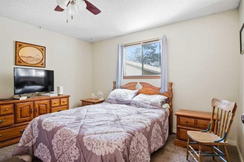4306 55 Avenue, Olds, AB - Indoor Photo Showing Bedroom