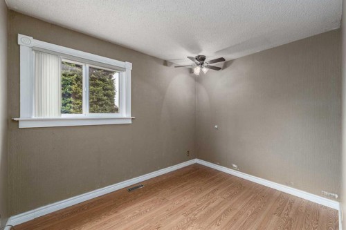 115 Ogden Way Se, Calgary, AB - Indoor Photo Showing Other Room