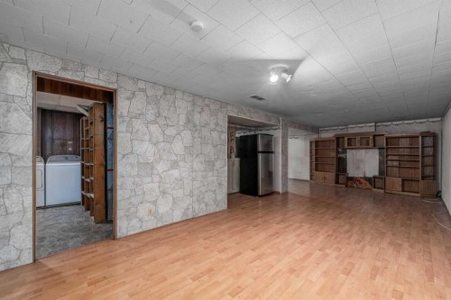 115 Ogden Way Se, Calgary, AB - Indoor Photo Showing Other Room
