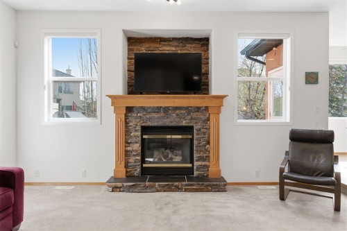 36 Wentworth Close Sw, Calgary, AB - Indoor Photo Showing Living Room With Fireplace