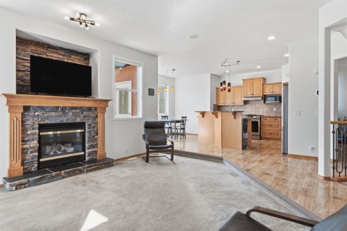 36 Wentworth Close Sw, Calgary, AB - Indoor Photo Showing Living Room With Fireplace