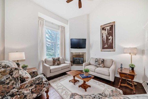 305 Sandringham Road Nw, Calgary, AB - Indoor Photo Showing Living Room With Fireplace