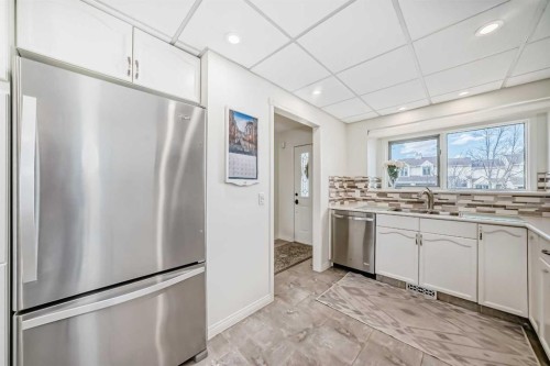 305 Sandringham Road Nw, Calgary, AB - Indoor Photo Showing Kitchen With Stainless Steel Kitchen With Double Sink