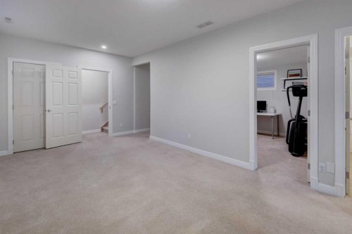 57 Discovery Ridge Hill Sw, Calgary, AB - Indoor Photo Showing Other Room