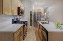 57 Discovery Ridge Hill Sw, Calgary, AB  - Indoor Photo Showing Kitchen With Double Sink With Upgraded Kitchen 