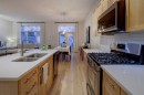 57 Discovery Ridge Hill Sw, Calgary, AB  - Indoor Photo Showing Kitchen With Double Sink 