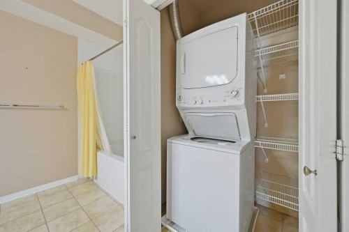 311-78 Prestwick Gardens Se, Calgary, AB - Indoor Photo Showing Laundry Room