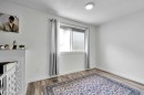 3-4543 7 Avenue Se, Calgary, AB  - Indoor Photo Showing Other Room With Fireplace 