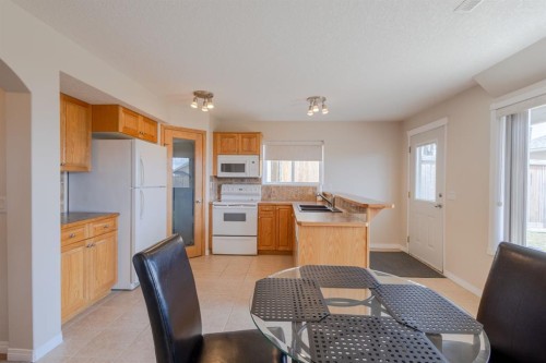 37 Royal Birch Close Nw, Calgary, AB - Indoor Photo Showing Kitchen With Double Sink