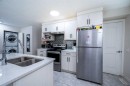 72 Faldale Close Ne, Calgary, AB  - Indoor Photo Showing Kitchen With Stainless Steel Kitchen With Double Sink 