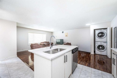 72 Faldale Close Ne, Calgary, AB - Indoor Photo Showing Laundry Room