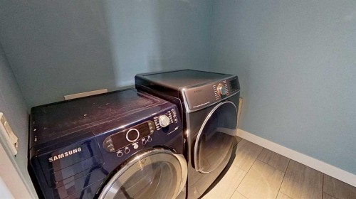 29 Sunrise Close Se, High River, AB - Indoor Photo Showing Laundry Room