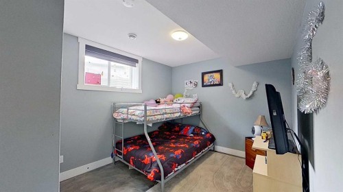 29 Sunrise Close Se, High River, AB - Indoor Photo Showing Bedroom