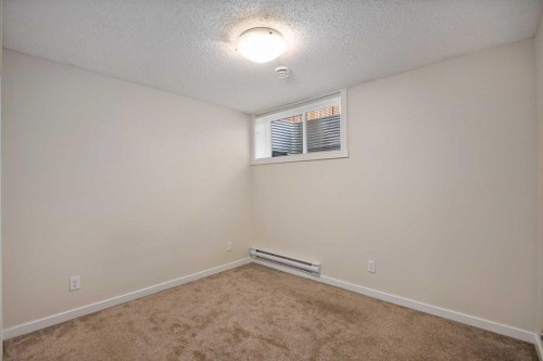 305 Cranbrook Square Se, Calgary, AB - Indoor Photo Showing Other Room