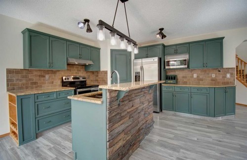 96 Cranfield Park Se, Calgary, AB - Indoor Photo Showing Kitchen With Upgraded Kitchen