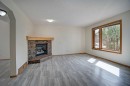 96 Cranfield Park Se, Calgary, AB  - Indoor Photo Showing Living Room With Fireplace 