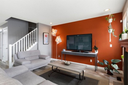 18 West Springs Gate Sw, Calgary, AB - Indoor Photo Showing Living Room