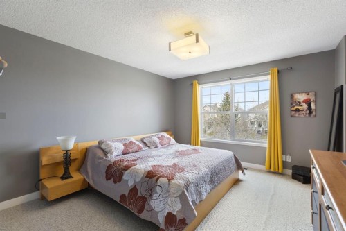 18 West Springs Gate Sw, Calgary, AB - Indoor Photo Showing Bedroom