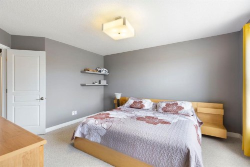 18 West Springs Gate Sw, Calgary, AB - Indoor Photo Showing Bedroom