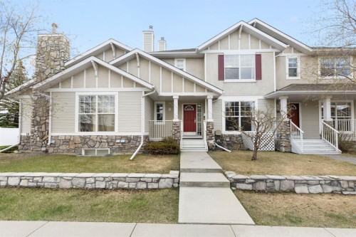 18 West Springs Gate Sw, Calgary, AB - Outdoor With Deck Patio Veranda With Facade