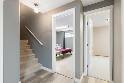 18 West Springs Gate Sw, Calgary, AB - Indoor Photo Showing Other Room