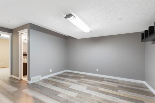 18 West Springs Gate Sw, Calgary, AB - Indoor Photo Showing Other Room