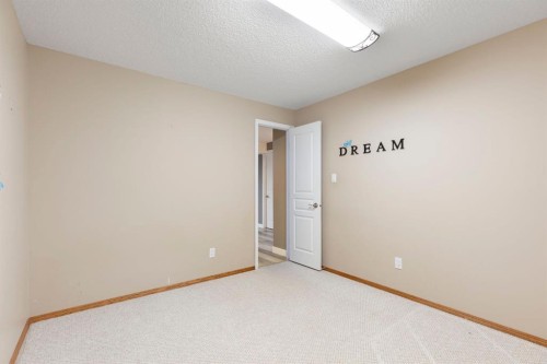 18 West Springs Gate Sw, Calgary, AB - Indoor Photo Showing Other Room