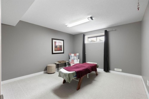 18 West Springs Gate Sw, Calgary, AB - Indoor Photo Showing Other Room