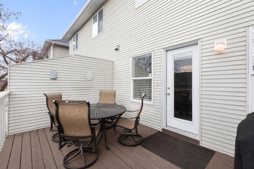 18 West Springs Gate Sw, Calgary, AB - Outdoor With Deck Patio Veranda With Exterior
