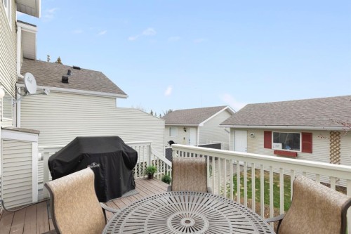 18 West Springs Gate Sw, Calgary, AB - Outdoor With Deck Patio Veranda With Exterior