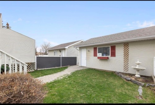 18 West Springs Gate Sw, Calgary, AB - Outdoor With Exterior